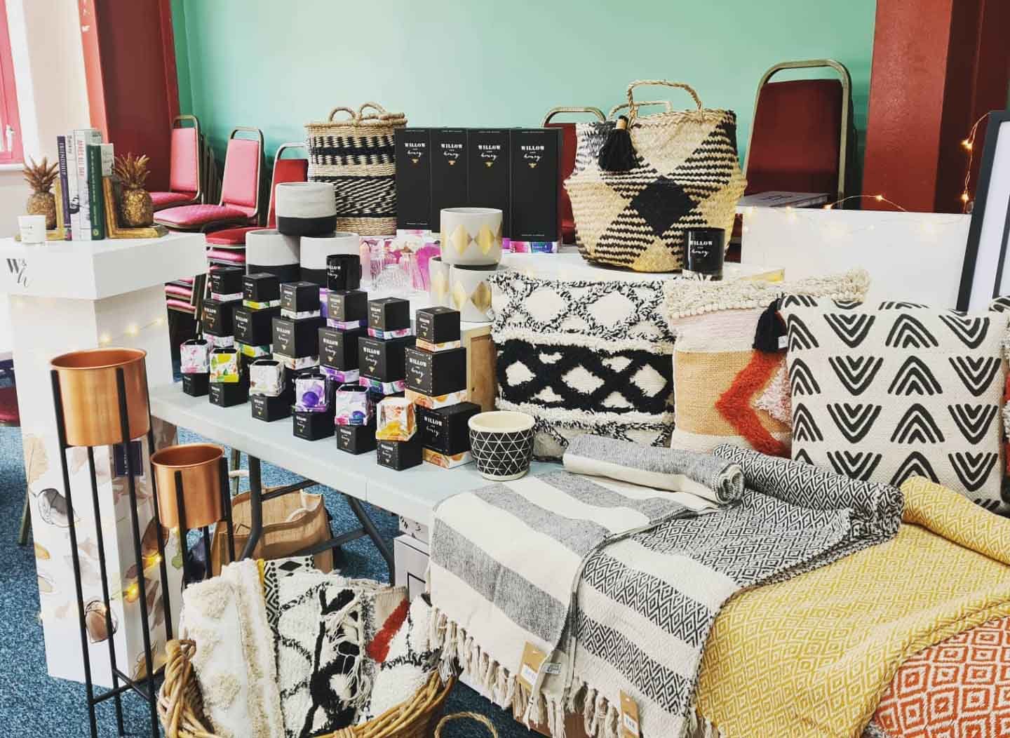 white candle and diffusers